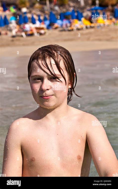 Smart Smiling Boy At The Beach Stock Photo Alamy