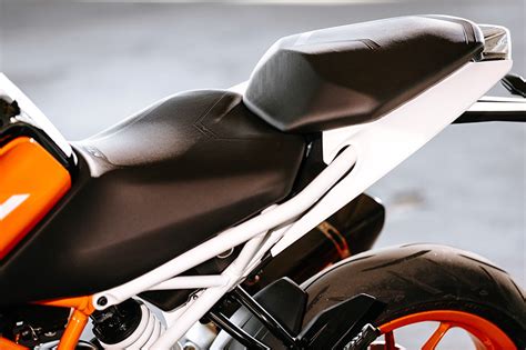 Ktm 125 duke features an 818 mm seat height which would not be comfortable as per your requirement. 2017 KTM 390 Duke | First Ride Review | Rider Magazine