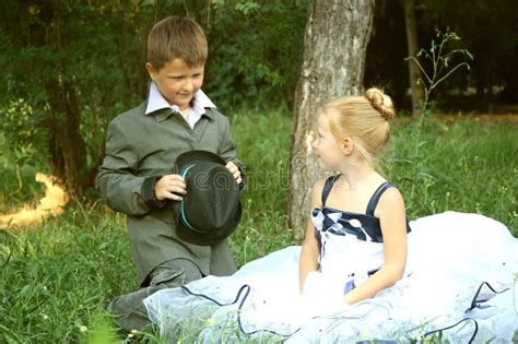 A Little Boy And Girl In A Romantic Scene Stock Image Image Of Love