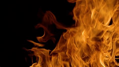 Flames Of Fire On Black Background In Slow Stock Motion Graphics Sbv