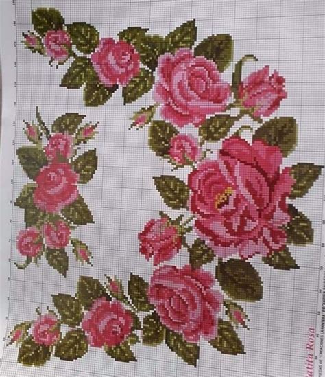 A Cross Stitch Pattern With Pink Roses And Green Leaves