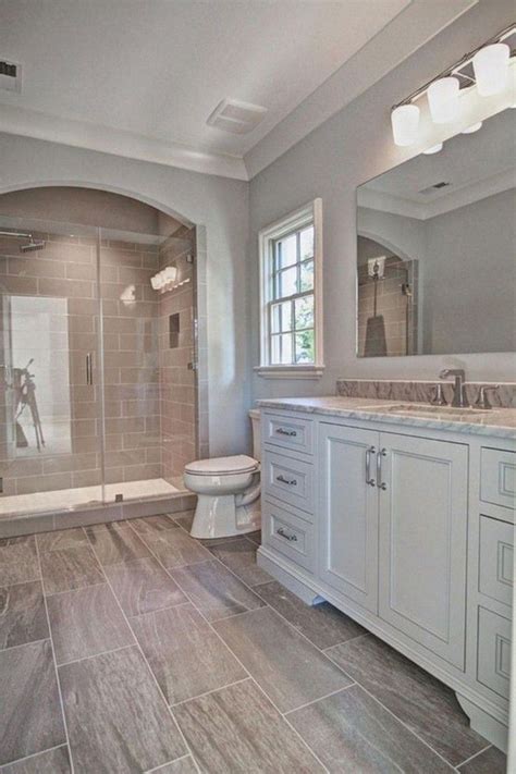 Master bathroom featuring beige walls and beige tiles floors. 73+ Awesome Farmhouse Rustic Master Bathroom Remodel Ideas ...