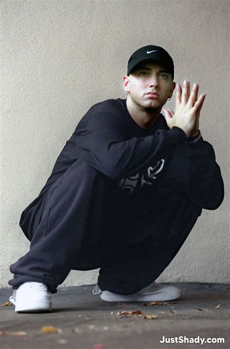 Eminem Photoshoot By Gary Friedman 02 Nike Cap And D12 Sweater Holdnig