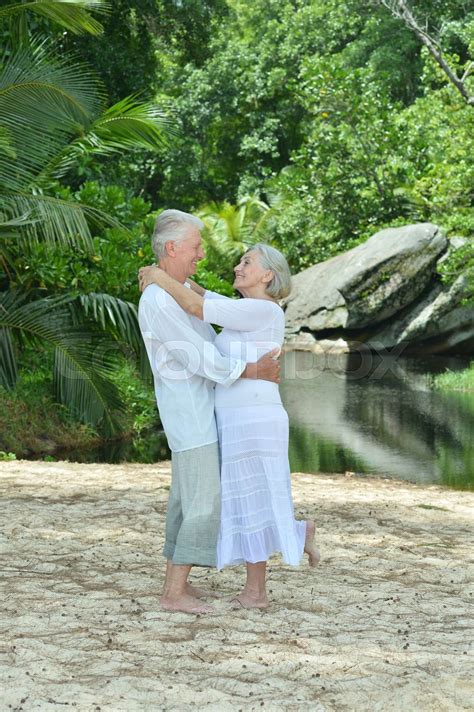 Happy Elderly Couple Hugging Stock Image Colourbox