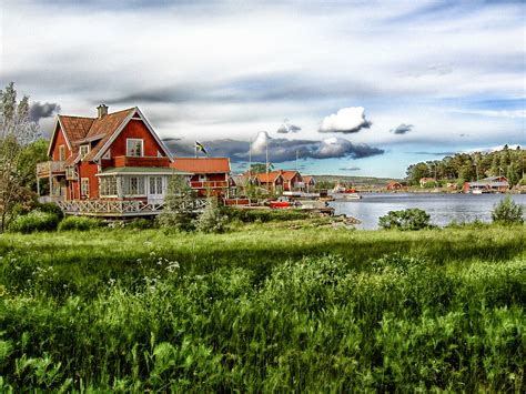 72 Schweden Landschaft Häuser Isaninseliiri