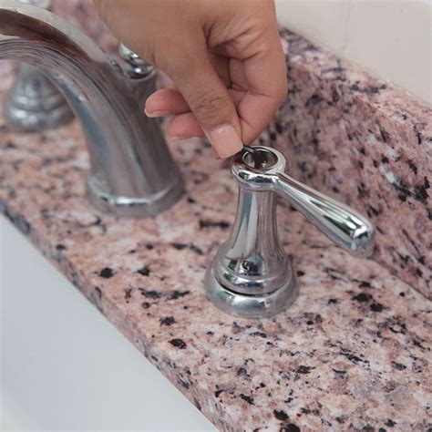 Start by removing the faucet that's in. How To Remove A Moen Bathroom Faucet Handle | MyCoffeepot.Org