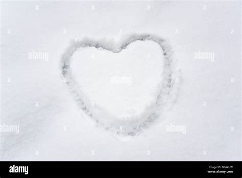 Heart Shape In Snow Stock Photo Alamy