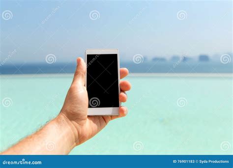 Close Up Of Male Hand Holding Smartphone On Beach Stock Image Image