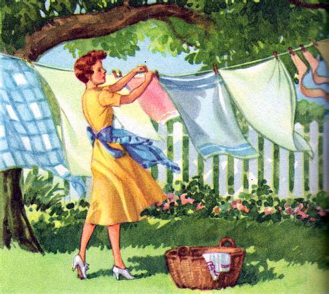 A Woman Hanging Out Her Clothes On A Line In The Yard By A Tree And Basket