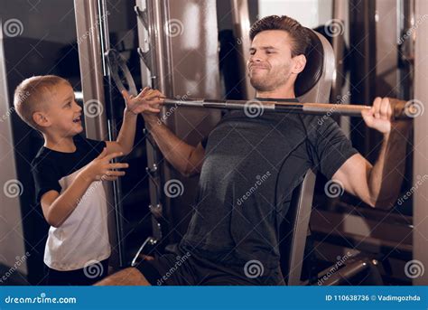 Father And Son In The Gym Father And Son Spend Time Together And Lead