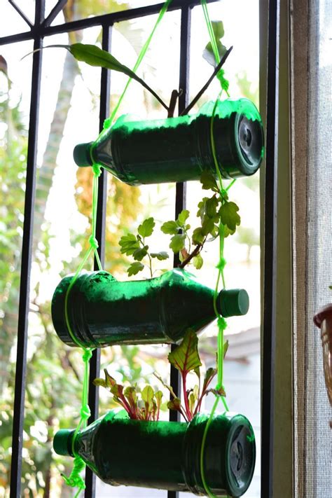 Make your own vertical planter with only $30 and a few hours of your time! DIY Hanging Planter or Vertical bottle garden. Best out of ...