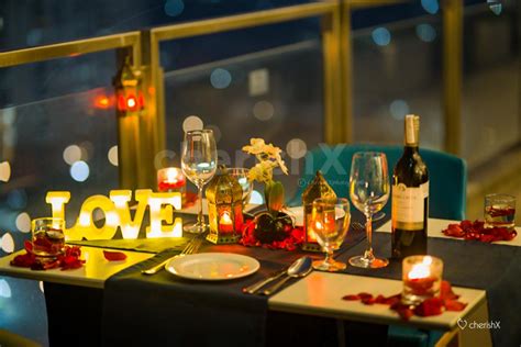 a breathtaking romantic candle light dinner with balcony view on 16th floor in delhi ncr delhi ncr