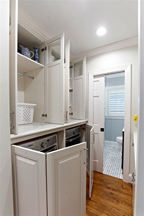 Huge sale on white laundry room cabinets now on. Walker Woodworking custom cabinets, white laundry room ...