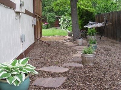 How does the backyard gardener get their spawn? side yard - flag stones with wood chips | Large backyard ...