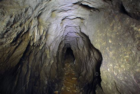 Tunnel In Rock Cave Stock Photo Offset