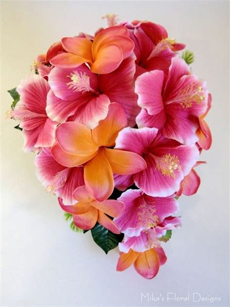 This micro peach silk open rose bush looks great in any space. Hibiscus & plumeria bouquet - $110 Approx. 23cm (W) x 33cm ...