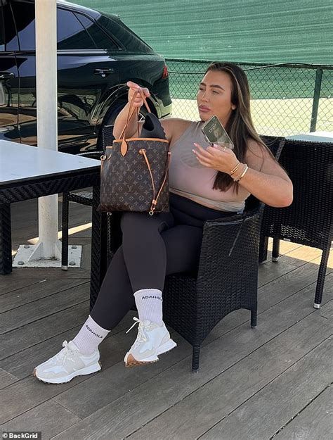 Lauren Goodger Showcases Her Curves In Black Leggings And A Beige Crop Top As She Hits The Gym