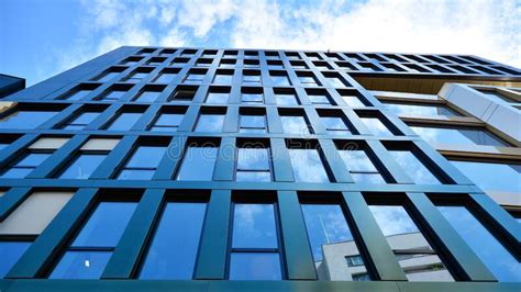 Structural Glass Wall Reflecting Blue Sky Abstract Modern Architecture