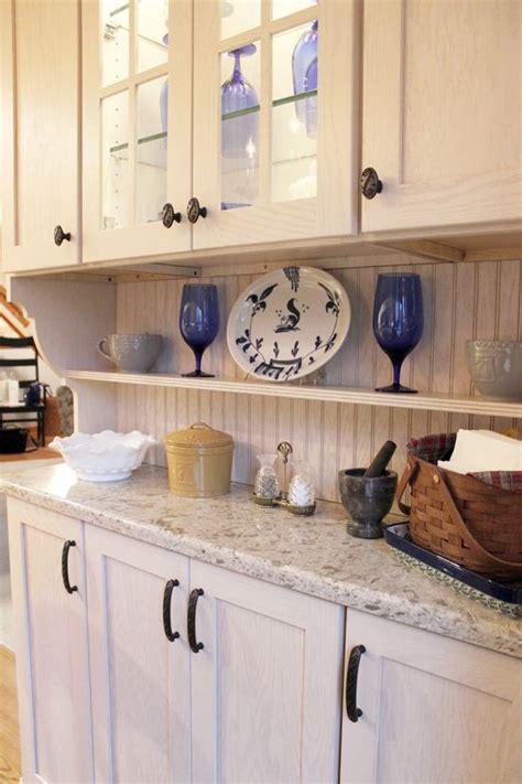Due to its similarity to marble, this stone has recently been used by almost every designer. Beautiful white kitchen cabinetry accented with Cambria Windermere Quartz countertop. | Lake ...