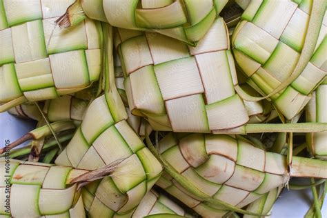 Ketupat Lebaran Served With Sambal Goreng Kentang And Opor Ayam