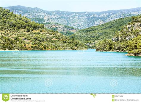 Turquoise Lake And The Mountains In Forest Stock Photo Image Of Green