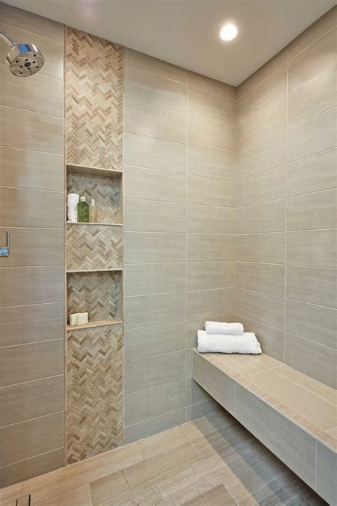 Try something a little different by choosing a wood. Bathroom shower accent wall tile - Legno Small Herringbone ...