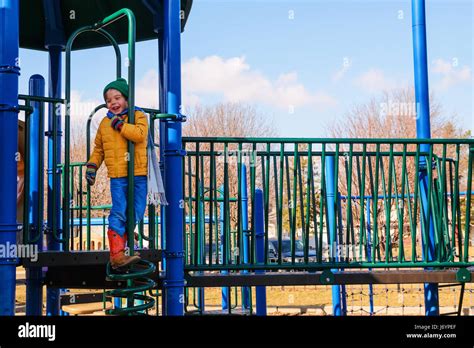 Boy Playing A Playground Stock Photo Alamy