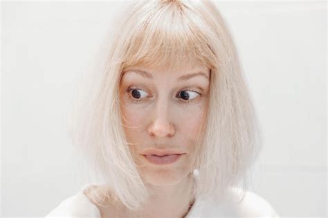 Premium Photo Portrait Of A Surprised Woman On A White Background