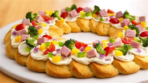 But the main idea of having a christmas appetizer is that people take interest in your christmas food. Ham and Veggie Crescent Wreath recipe from Pillsbury.com