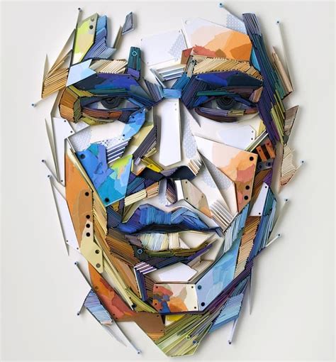 A Man S Face Made Out Of Different Colored Papers