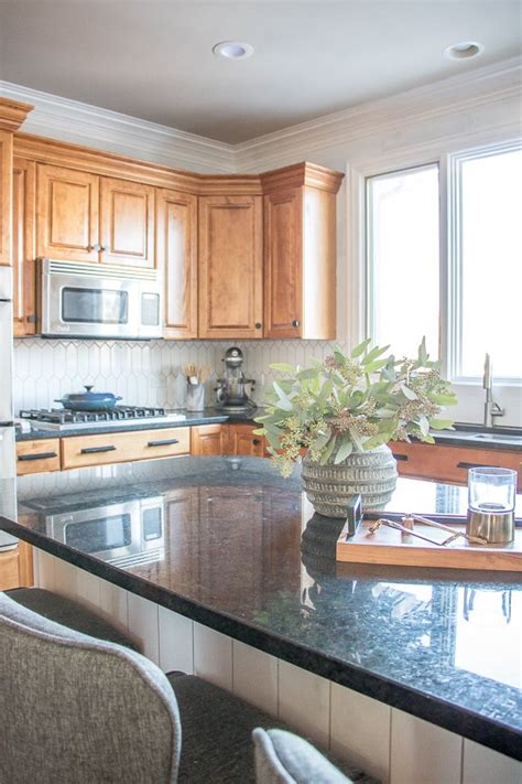 Installing a tile backsplash using bondera. How to DIY Install a Tile Backsplash - Sypsie Designs