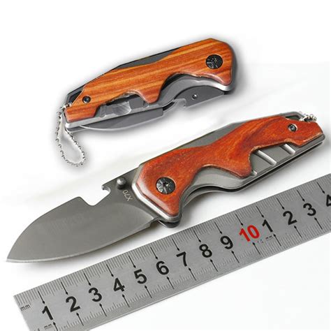 Free Shipping X70 Steel Folding Knife Wood Handle Survival Tactical