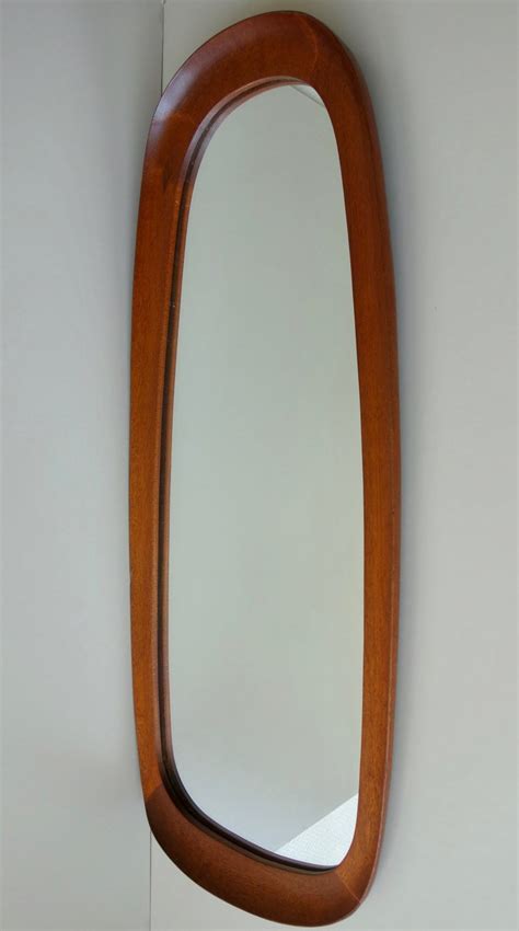 Oval organic asymmetrical shaped vintage teak wooden mirror with nice