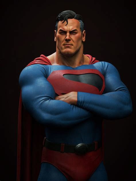 The Superman Statue Is Posed With His Arms Crossed And His Head Turned To Look Like He S Frowning
