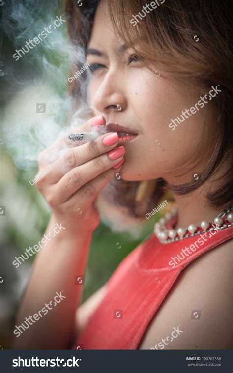 Young Asian Woman Smoking Cigarette Stock Photo 190762358 Shutterstock