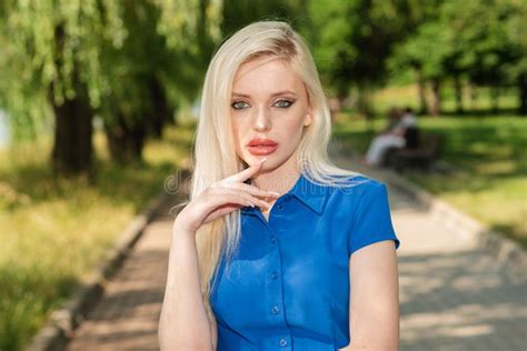 portrait of a beautiful blonde girl outdoors in summer stock image image of fashionable