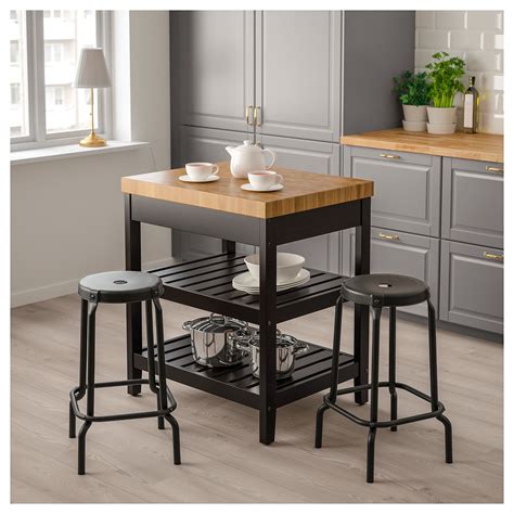 Vadholma is the home's given meeting point and perfect when you cook together. VADHOLMA Kitchen island, black, oak. Find it here - IKEA ...