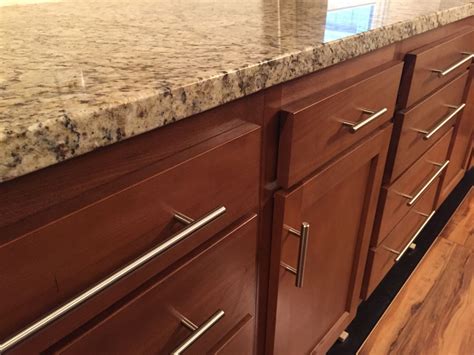 Single door wall units are reversible for right or left hinging, simply turn the cabinet over. My new kitchen with Giallo Ornamental Light granite with ...