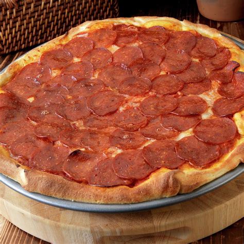 A Large Pepperoni Pizza Photograph By Paul Poplis Pixels