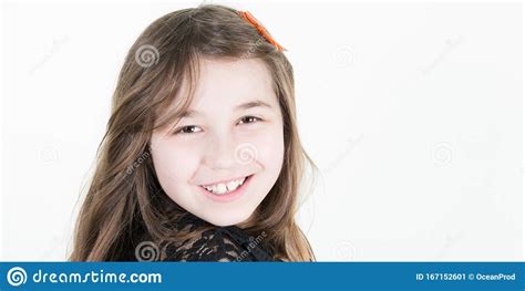Close Up Of A 10 Year Old Girl Smiling At The Camera Stock Image