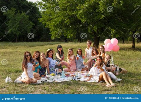 Group Photo Of Young Girls On Picnic Party At Nature Editorial Image