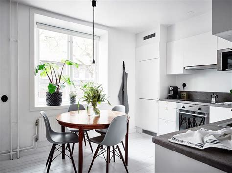 White Kitchen With A Round Dining Table Coco Lapine Design Kitchen