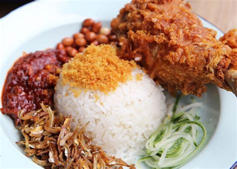 Much like most nasi lemak stalls, you will be served a standard plate of santan rice and essential ingredients such as ikan bilis, boiled egg, and cucumber. Best nasi lemak in Singapore: The top 20 picks | Honeycombers