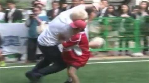 Watch Boris Johnson Rugby Tackles 10 Year Old Boy In Japan Metro Video