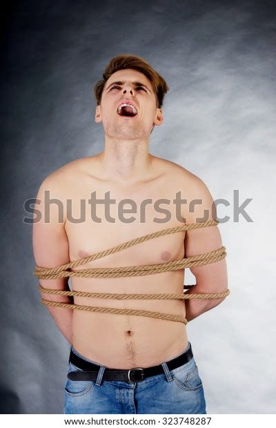 Tortured Shirtless Man Tied Rope Arkistovalokuva Shutterstock