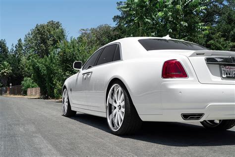 Custom White Rolls Royce Ghost Enhanced With Chrome Grille And Other