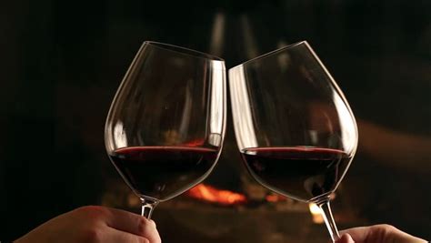 Young Couple Toasting Wine Glass In Restaurant Dating Young Man And Woman On Romantic Dinner