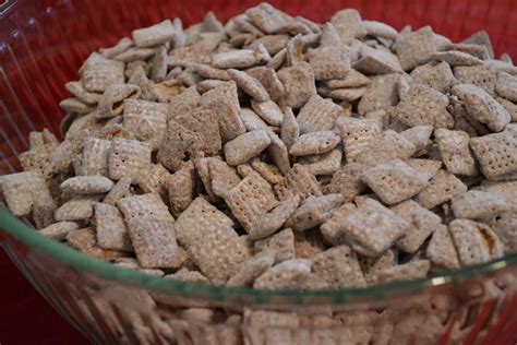 General mills, the maker of chex cereal, officially calls the snack muddy buddies, but i grew up calling it puppy chow, so i'm sticking to that. Much Ado About Somethin: Puppy Chow Recipe