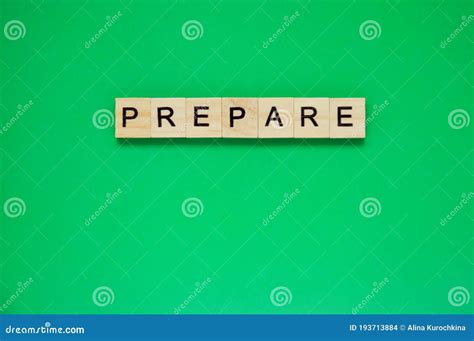 Word Prepare Top View Of Wooden Blocks With Letters On Green Surface