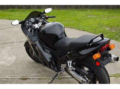 Has 3 keys cut and coded home made stainless steel rear rack with extra grab handles intergrated in, tow bar with wired trailer plug, near new front tyre less than 1000kms old and a new battery. 1997 Honda CBR Blackbird 1100XX for sale on 2040motos